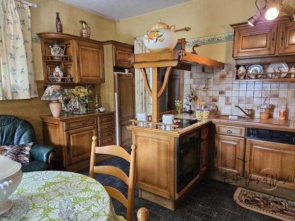 Propriété 3 logements avec terrain et garages