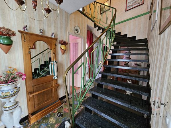 Propriété 3 logements avec terrain et garages