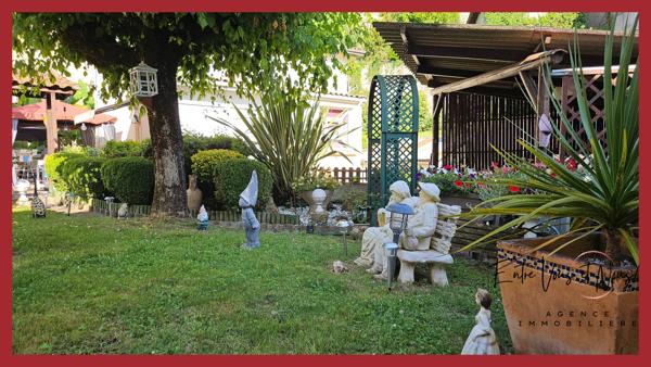 Propriété 3 logements avec terrain et garages
