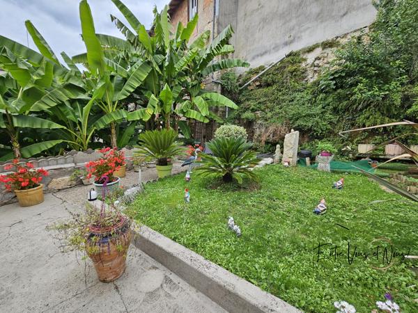 Propriété 3 logements avec terrain et garages