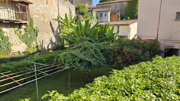 Propriété 3 logements avec terrain et garages