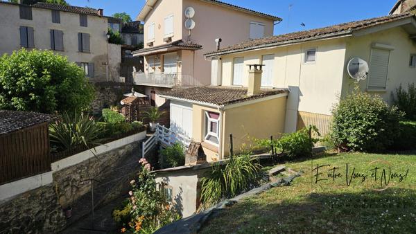 Propriété 3 logements avec terrain et garages