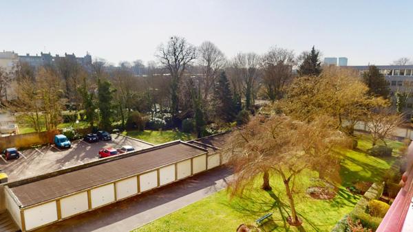 Appartement 121 m² avec studio loué, balcon, garage et cave