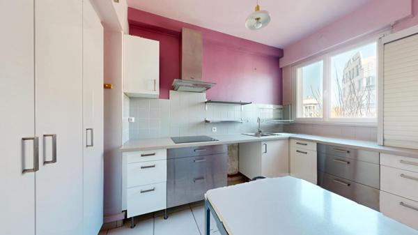 Appartement 121 m² avec studio loué, balcon, garage et cave