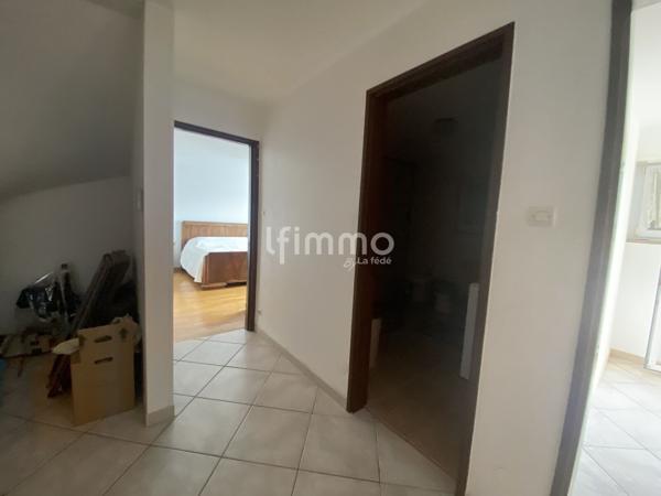 Maison individuelle avec un terrain de 11 ares constructible