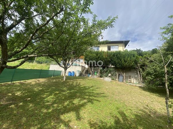 Maison individuelle avec un terrain de 11 ares constructible