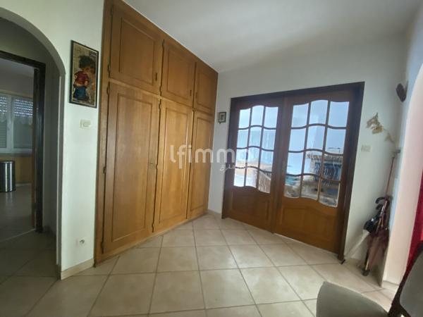 Maison individuelle avec un terrain de 11 ares constructible