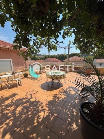 Maison 104m2 avec terrasse, véranda et jardin