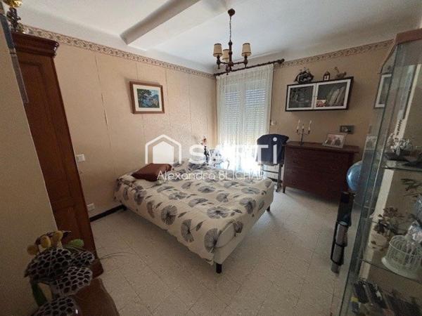 Maison 104m2 avec terrasse, véranda et jardin