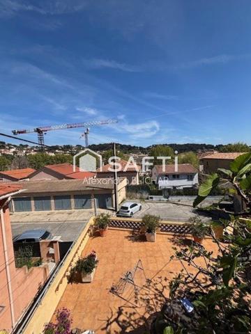 Maison 104m2 avec terrasse, véranda et jardin