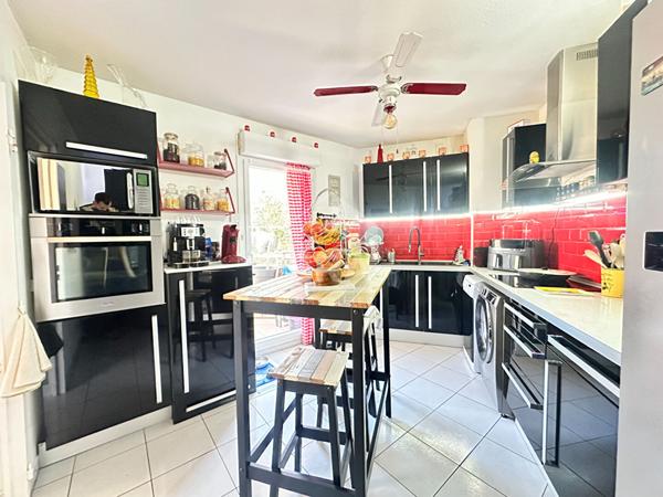 T3 avec extérieur de 23.70 m² + 1 garage et 1 place de parking