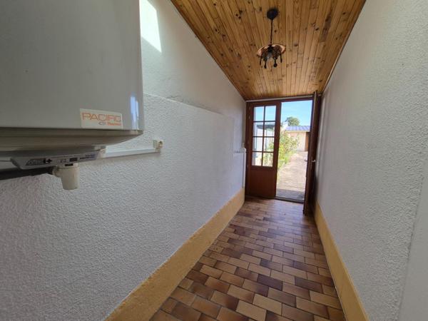 PLAIN PIED  proche commerces-jardin-garage-atelier