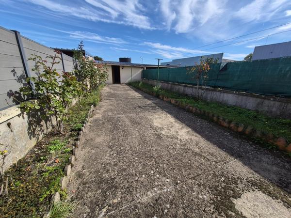 PLAIN PIED  proche commerces-jardin-garage-atelier