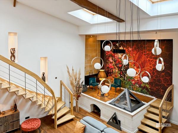 Élégance et prestige : maison en pierre de 215 m² avec prestations haut de gamme et terrasse, piscine