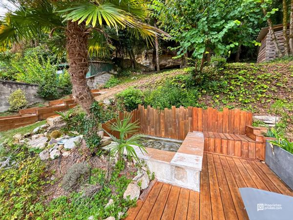 Élégance et prestige : maison en pierre de 215 m² avec prestations haut de gamme et terrasse, piscine