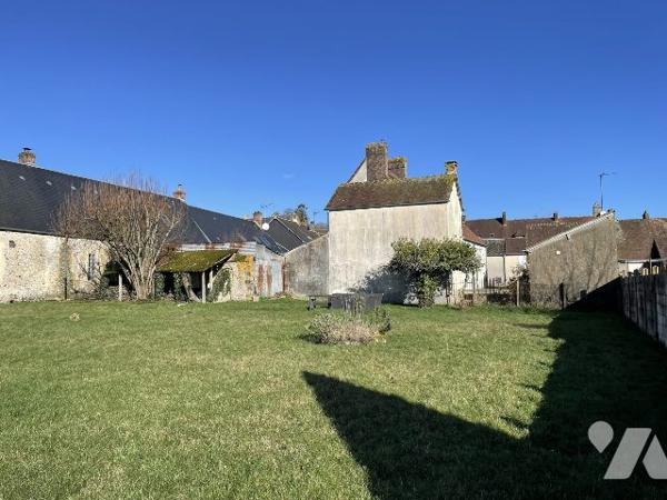 MAISON AVEC JARDIN ET GARAGE EN CENTRE-VILLE