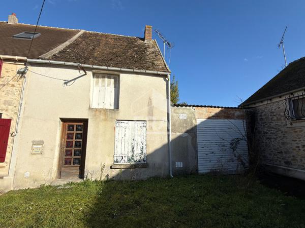 Maison de ville à fort potentiel