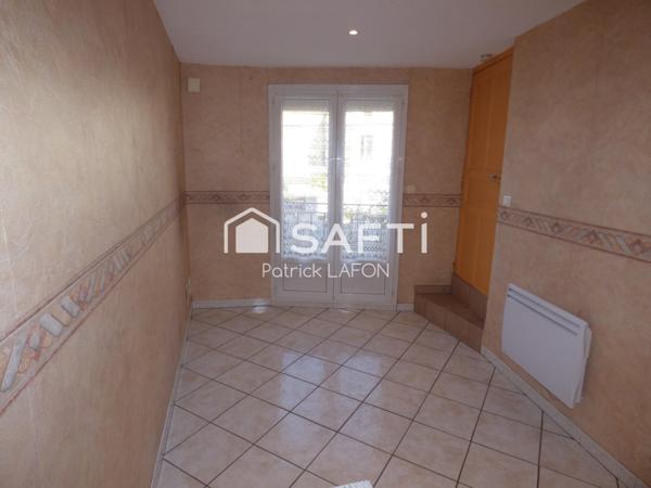 MAISON AVEC GARAGE AU CENTRE