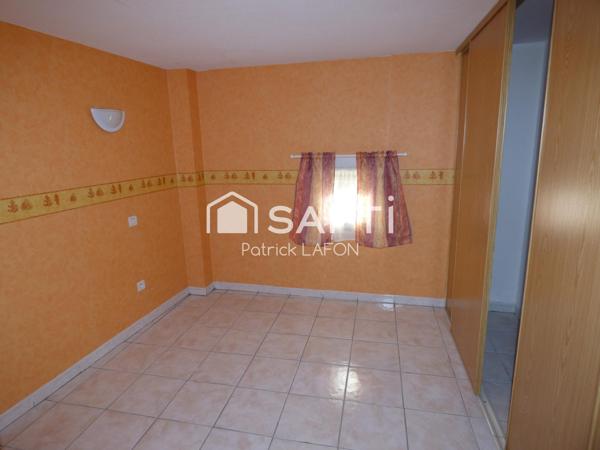 MAISON AVEC GARAGE AU CENTRE