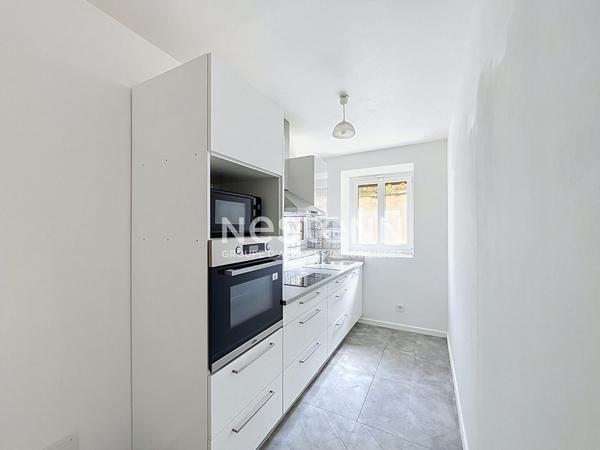 Appartement  3 pièce(s) 55.95m² Angerville avec cour et garage