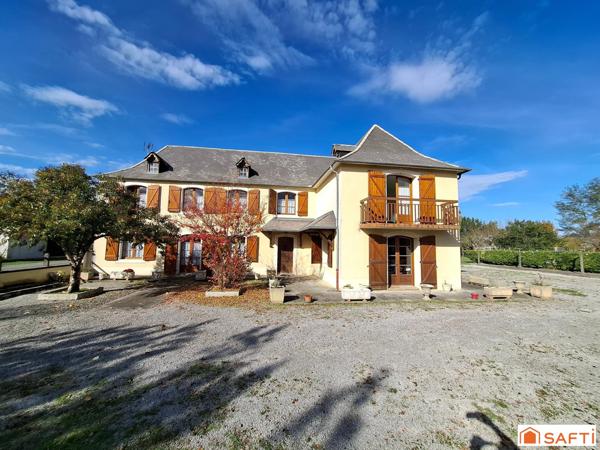 Maison familiale sur vaste terrain avec dépendances et fort potentiel