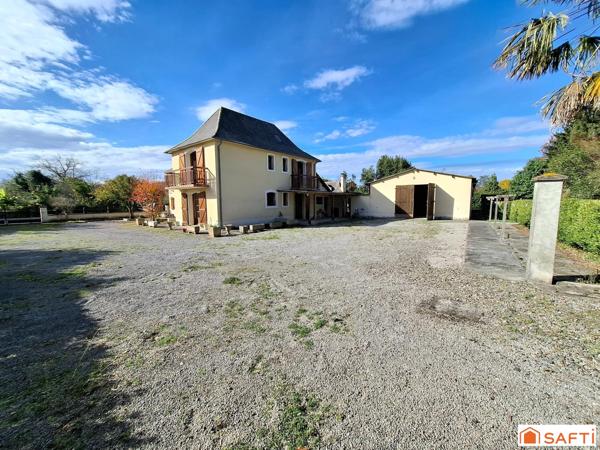 Maison familiale sur vaste terrain avec dépendances et fort potentiel