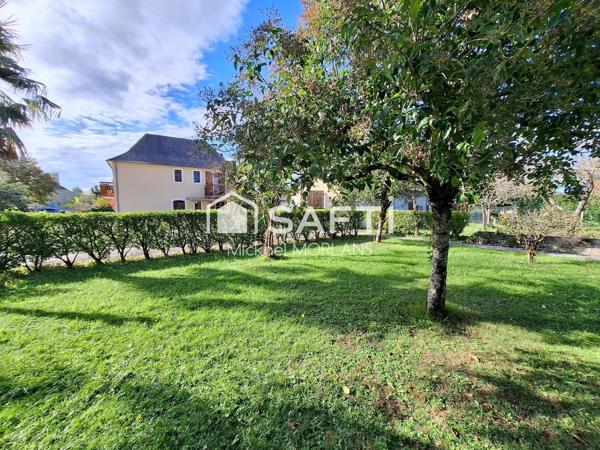 Maison familiale sur vaste terrain avec dépendances et fort potentiel