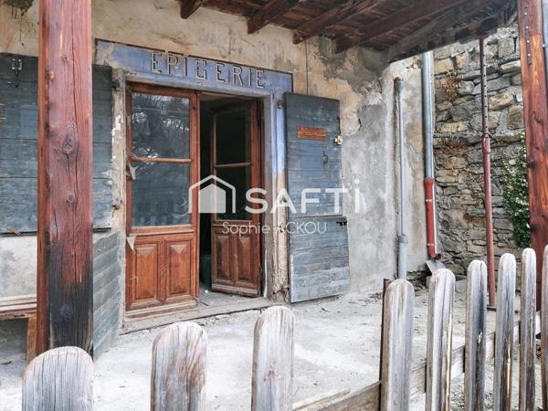 Au coeur du village, un potentiel rare vous attend!!