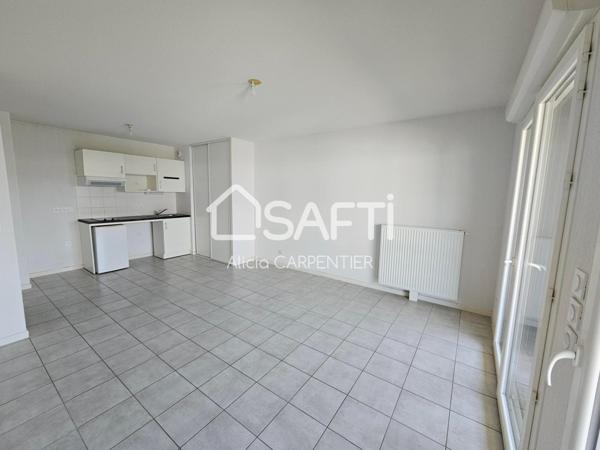 Appartement vendu loué avec ascenseur et une place de parking privative sécurisée
