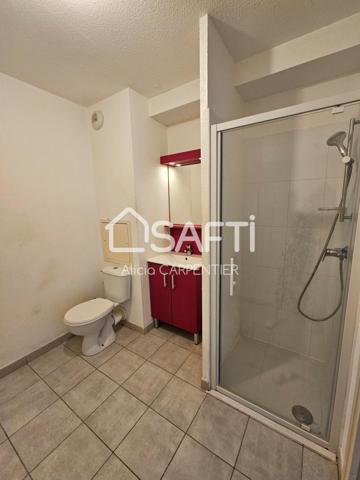 Appartement vendu loué avec ascenseur et une place de parking privative sécurisée