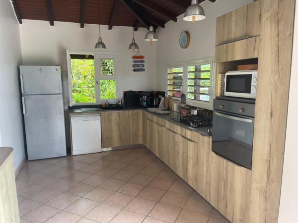 Superbe villa VUE GRAND CUL SAC MARIN avec piscine sur 1001 m² de terrain plat