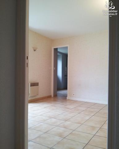 Immeuble composé de 4 appartements dont 3 loués, caves et terrain attenant le tout sur 400 m².