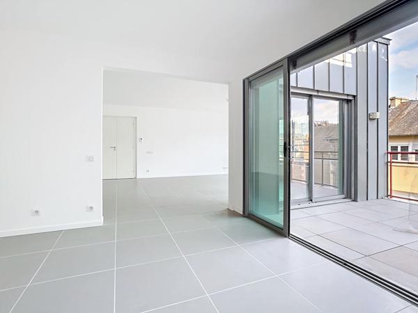 Appartement avec terrasse à vendre à Brive la Gaillarde - Quartier ancienne caserne - 2 chambres - Une terrasse - Pompe à chaleur