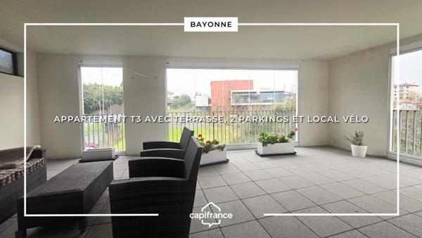Appartement T3 avec terrasse / véranda, 2 parkings et local vélo