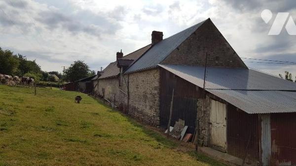 5 min. VILLAINES-LA-JUHEL (53):
Un ensemble immobilier composé de:
1) Une maison d'habitation...