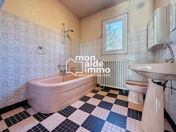 Maison sur sous-sol et terrain