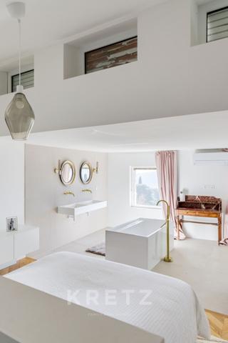 Maison de ville avec rooftop, jardin et dépendance.