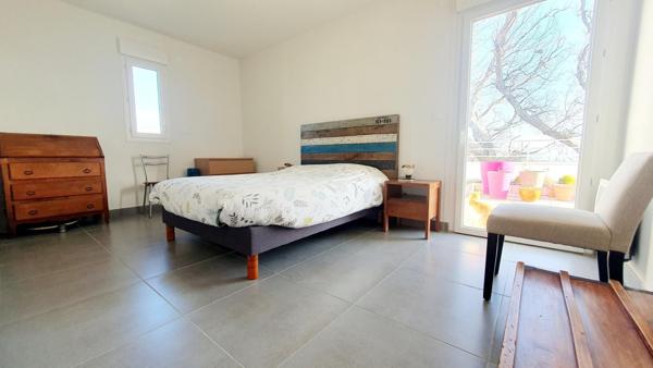 Appartement 105 m2 - pièce de vie avec cuisine ouverte - 1 suite parentale - 2 chambres - 2 salles de bains - 2 grandes terrasses et 2 places de  privatives