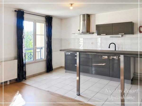 Appartement récent 3 pièces avec place de stationnement – 68 m²