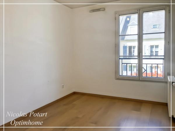 Appartement récent 3 pièces avec place de stationnement – 68 m²