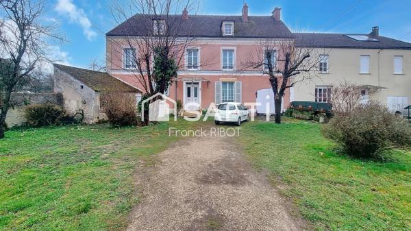 Maison de 205m2 avec jardin, garage, et caractère