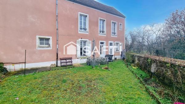 Maison de 205m2 avec jardin, garage, et caractère