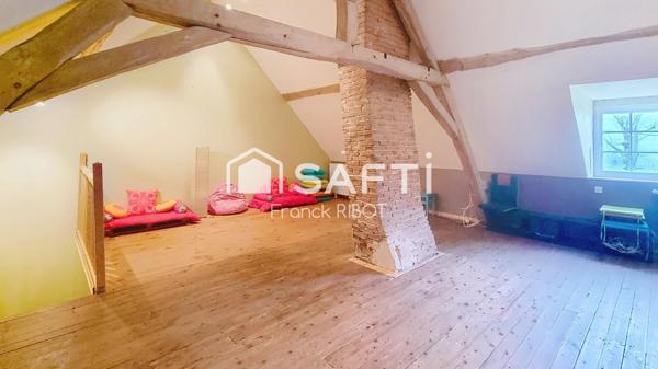 Maison de 205m2 avec jardin, garage, et caractère