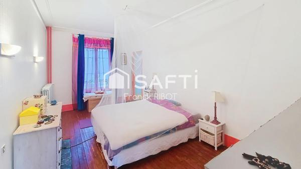 Maison de 205m2 avec jardin, garage, et caractère