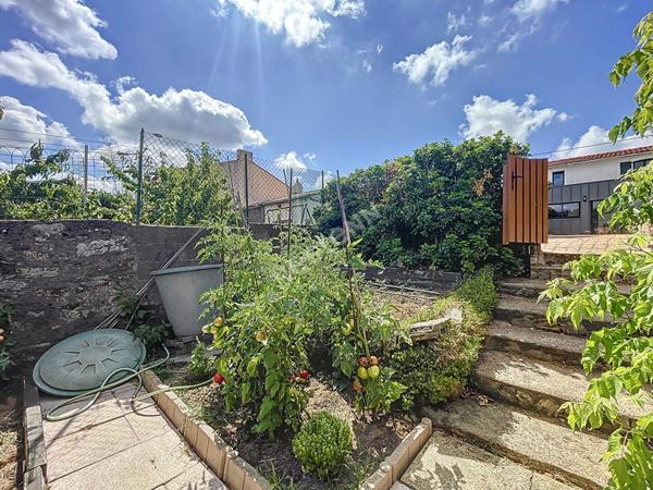 Charmante maison à vendre à Saint Jean de Boiseau 3 chambres , jardin et garage.