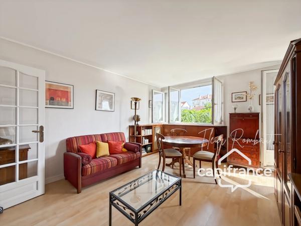 Appartement 2 pièces lumineux avec loggia, balcon, cave et parking proche gare