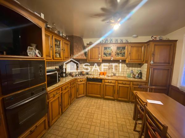 Description de cette maison de 97m², aux Rives d'Andaines