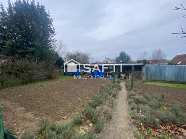 Description de cette maison de 97m², aux Rives d'Andaines