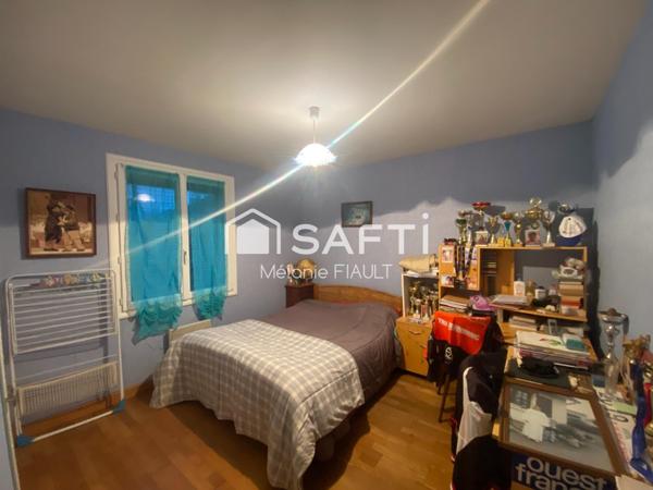 Description de cette maison de 97m², aux Rives d'Andaines