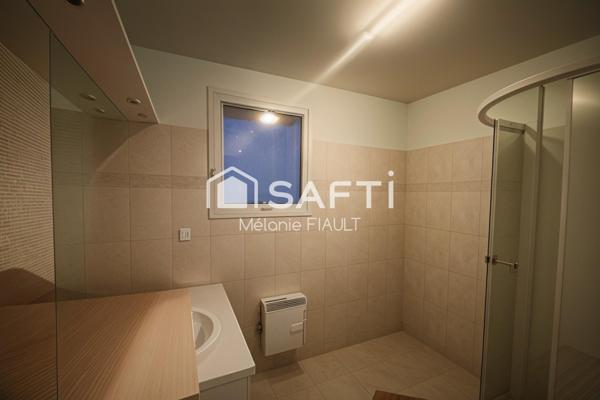 Description de cette maison de 97m², aux Rives d'Andaines